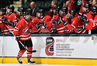 GRAND FORKS, NORTH DAKOTA - APRIL 23: Canada's Pascal Laberge #9 celebrates at the bench after giving his team a 1-0 lead over Sweden during semifinal round action at the 2016 IIHF Ice Hockey U18 World Championship. (Photo by Minas Panagiotakis/HHOF-IIHF Images)

